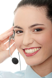 Close-up portrait of a smiling young woman