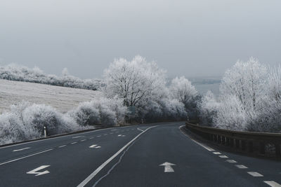 Empty road against sky