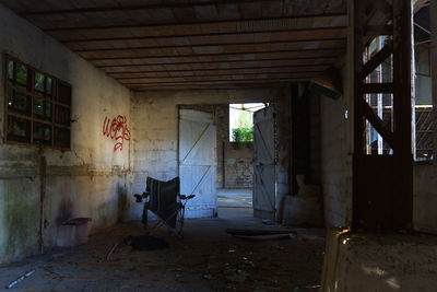 Empty chairs in abandoned room