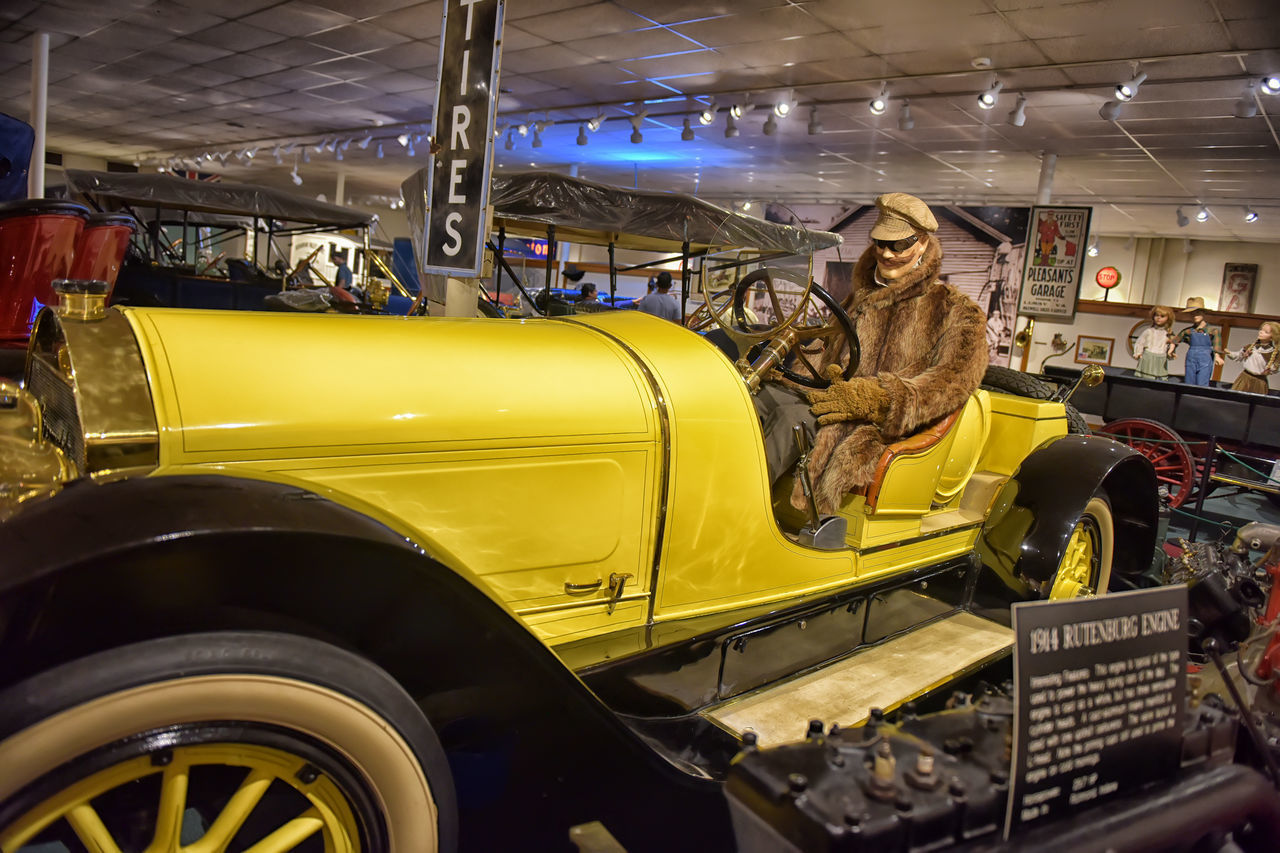 HIGH ANGLE VIEW OF YELLOW CAR