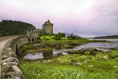 View of castle against cloudy sky