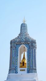 Low angle view of a building against blue sky