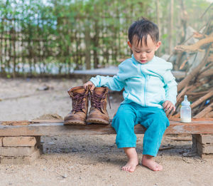 Full length of boy playing outdoors