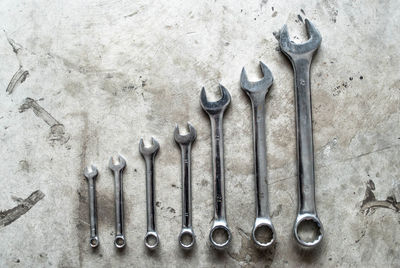 Directly above shot of wrenches on table