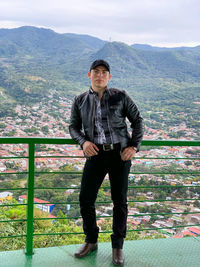 Young man in black jacket style and black clothes in a spectacular life in matagalpa, nicaragua