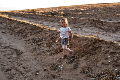 Full length of girl on beach