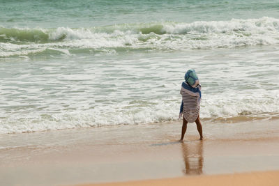 Man standing on beach