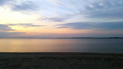 Scenic view of sea at sunset