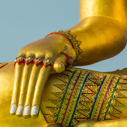 Close-up of yellow statue