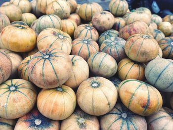 Full frame shot of pumpkins at market stall