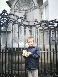 Full length portrait of boy standing outdoors