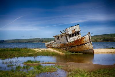 View of old boat in water