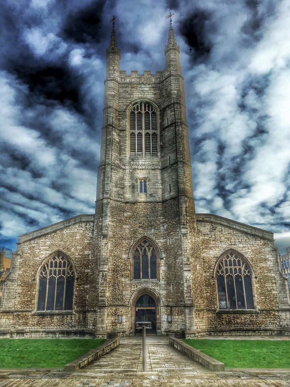 architecture, built structure, building exterior, sky, cloud - sky, religion, church, history, cloudy, low angle view, place of worship, old, spirituality, cloud, arch, cathedral, travel destinations, the past