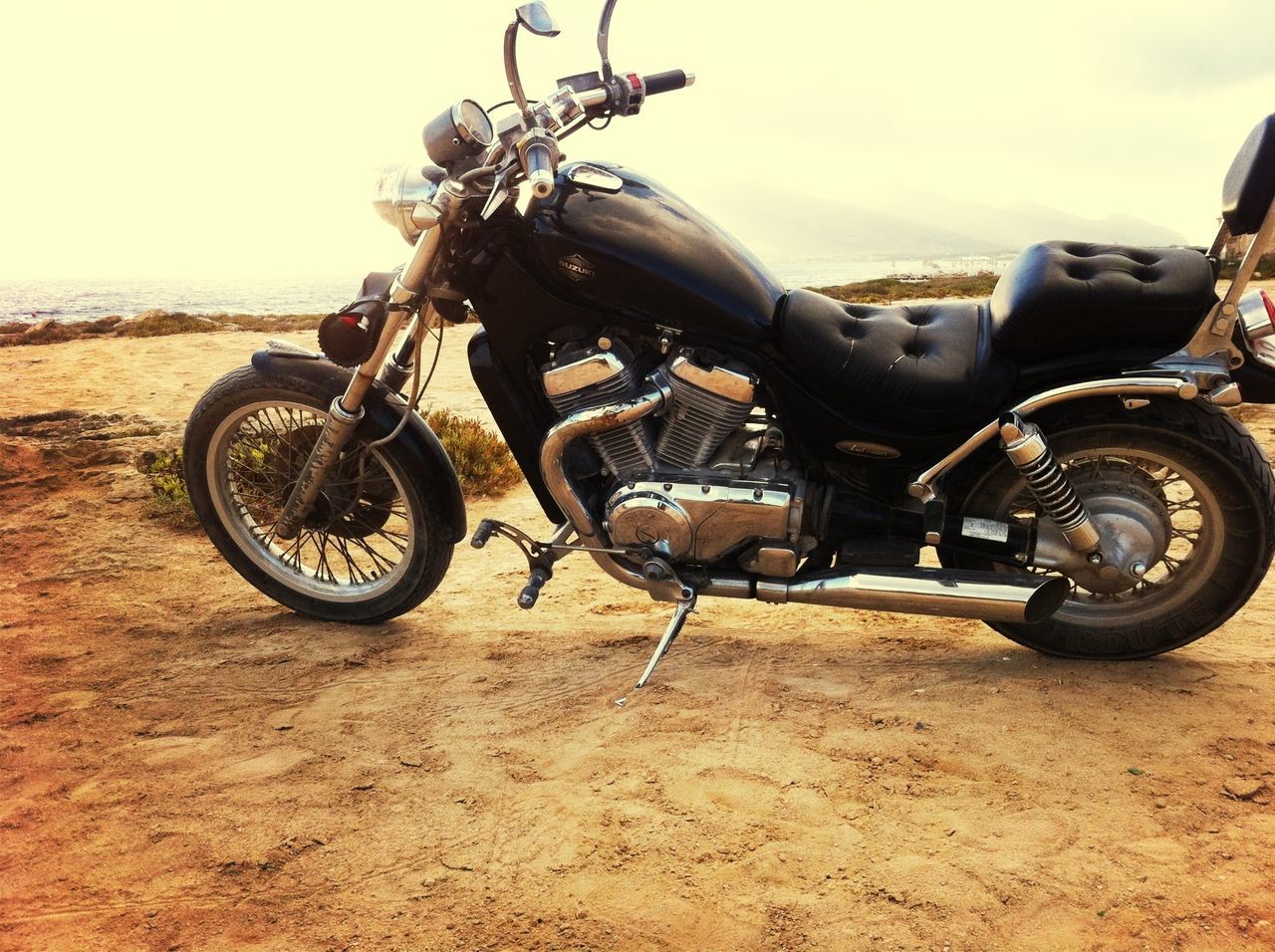 land vehicle, transportation, mode of transport, bicycle, stationary, car, parked, parking, motorcycle, wheel, travel, day, outdoors, street, old-fashioned, abandoned, old, sky, tire, sunlight