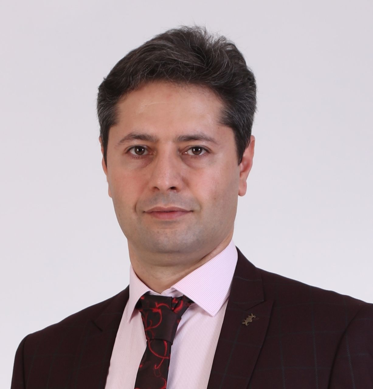 portrait, one person, adult, looking at camera, men, headshot, studio shot, formal wear, business, person, businessman, indoors, front view, emotion, white background, white-collar worker, clothing, smiling, tie, menswear, necktie, young adult, occupation, serious