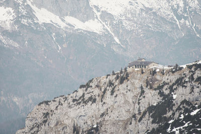 Building on mountain peak