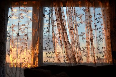 Low angle view of curtain against sky