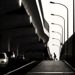 Woman walking on road