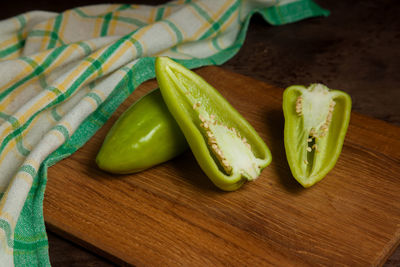 Close-up of green peas on cutting board