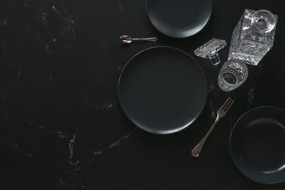 High angle view of black coffee on table