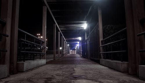 Man in illuminated city at night