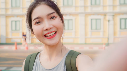 Portrait of smiling young woman