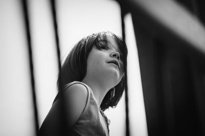 Low angle view of girl looking away