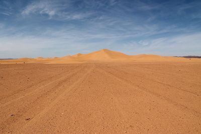 Scenic view of sahara desert against sky