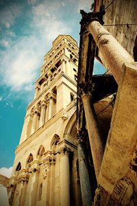 Low angle view of temple against sky in city