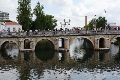 Bridge over river against sky