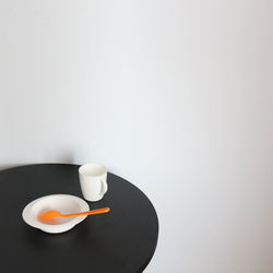 High angle view of breakfast on table against wall