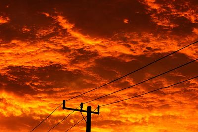 Low angle view of cloudy sky at sunset