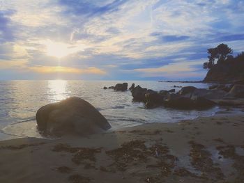 Scenic view of sea against sky during sunset