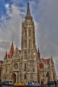 View of cathedral and buildings against sky