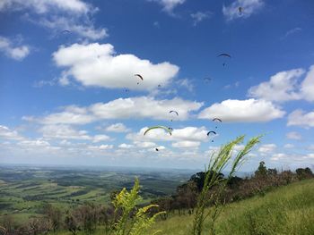 Scenic view of landscape against cloudy sky