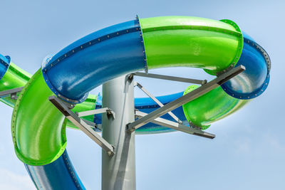 Low angle view of a water slide against sky