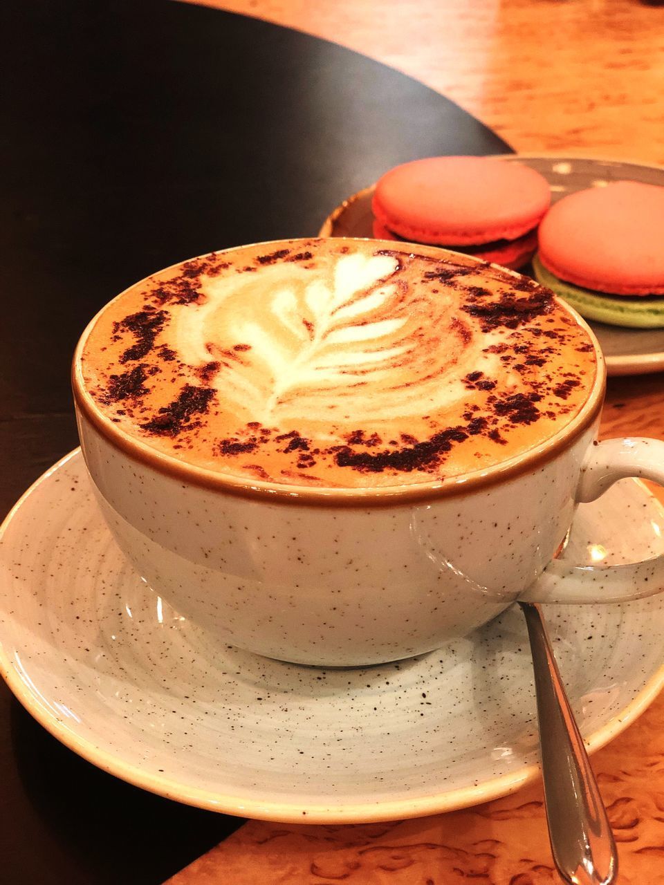 HIGH ANGLE VIEW OF CAPPUCCINO WITH COFFEE ON TABLE