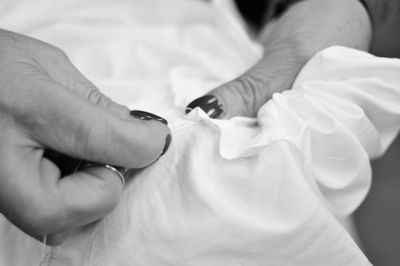 Close-up of people holding hands