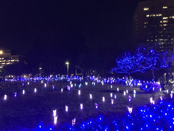 Illuminated buildings in city at night