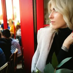 Woman looking away at cafe
