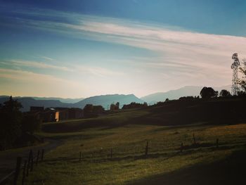 Scenic view of field against sky during sunset