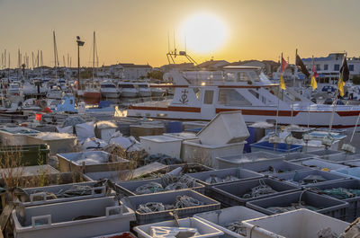 High angle view of harbor at sunset