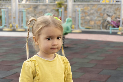 Portrait of cute little caucasian kid, looking ahead