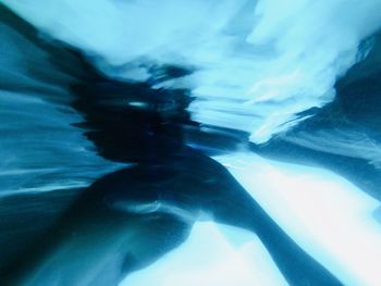 Close-up of person swimming in sea