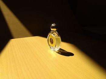 High angle view of umbrella on glass table