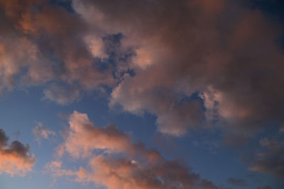 Low angle view of dramatic sky during sunset