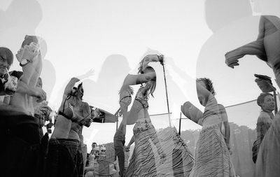 Low angle view of people against clear sky