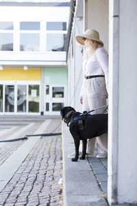 Woman with assistance dog
