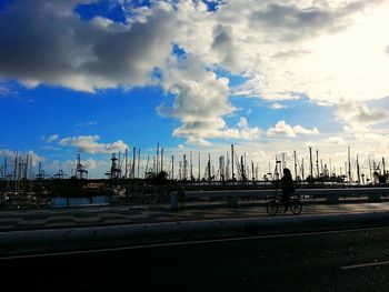 View of road against cloudy sky