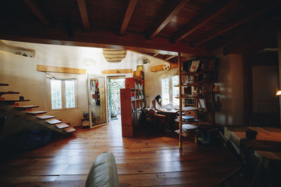 Freelancer using laptop in geodesic home